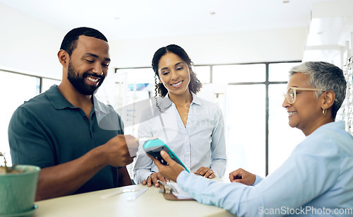 Image of Couple, card machine and payment, optometry and glasses store with retail, client and cashier, finance and eye care. Health, retail and commerce, financial and people at clinic for vision and eyewear