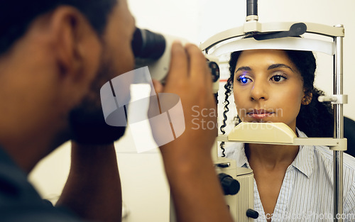 Image of Woman, optometrist and eye exam with vision and laser machine, health and vision with optometry and wellness at clinic. Patient, man and scan retina for assessment with prescription and technology