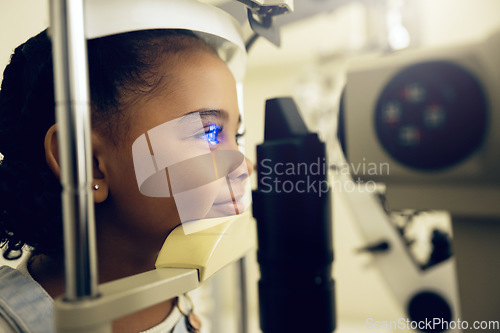 Image of Girl kid, face and eye exam with vision and laser machine, health and vision with optometry and wellness at clinic. Patient, LED light and scan retina for assessment with prescription and technology