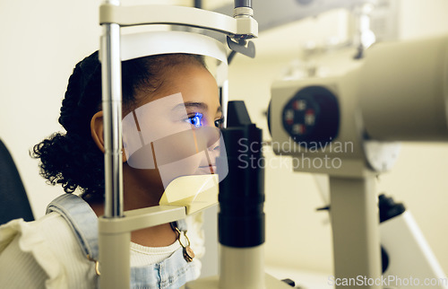 Image of Child, eye exam and optometry for medical, vision and healthcare consultation or glaucoma check. Young client or girl kid with laser technology, blue light or machine scanning and ophthalmology test