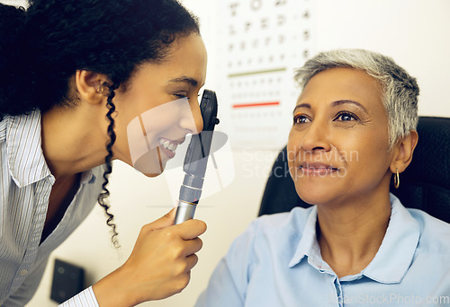 Image of Woman, eye exam and medical test with ophthalmoscope to check for glaucoma, ocular services and healthcare assessment. Expert optician, eyesight and retina analysis of mature patient with lens tools