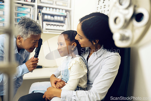 Image of Optometry, consultation and optometrist with child and mother at eye care appointment for test. Vision, medical and senior optician with young mom and girl kid patient with lenses in optical clinic.