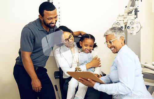 Image of Family, optometry and eye care with a woman doctor in a clinic to see a patient for vision assessment. Mother, father and daughter at the optometrist for an appointment to test eyesight for kids