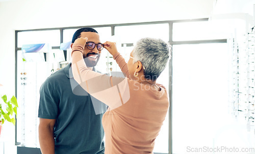 Image of Optometry, glasses and woman with client for decision, choice and options in optician store for vision. Healthcare, ophthalmology and people consulting and prescription lens, spectacles and frames