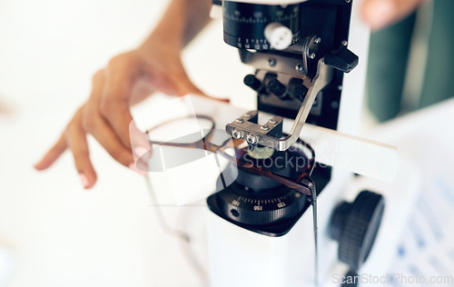 Image of Lens, glasses or hand with tool for eye care, vision and focus with closeup at optometrist or optometry. Eye care, ophthalmology and healthcare for medical support, eyewear or spectacles to see