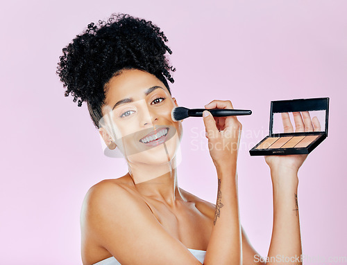 Image of Woman, makeup compact and brush with beauty, powder and application on face isolated on pink background. Shine, shimmer and cosmetic product in portrait, tools and foundation with self care in studio