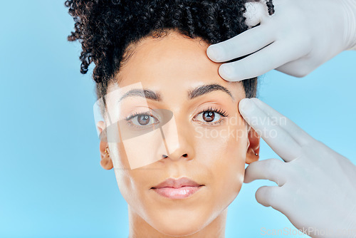 Image of Change, plastic surgery and portrait of woman with hands on face in studio for cosmetic facial consultation. Skincare, dermatology and professional collagen therapy, beauty model on blue background.