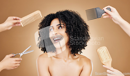 Image of Hair, woman and beauty with hands and tools choice for salon treatment with cosmetic care on studio background. Hairdresser, haircare and growth, strong texture and brush with comb and scissors
