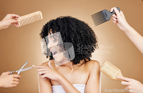 Image of Hair care, shock and tools of woman in a studio with curly, natural and salon treatment. Smile, beauty and model from Mexico with scissor, brush and comb for hairstyle isolated by brown background