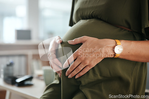 Image of Worker, office and pregnant with hands, stomach and relax for break, company and workplace. Woman, employee or pregnancy in career, work or job with love, affection or care for baby, closeup or belly