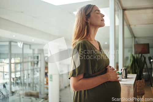 Image of Woman, relax or pregnant stomach in office break in breathing meditation in company workplace. Belly, calm employee or mom in pregnancy in career, work and job with peace, affection and care for baby