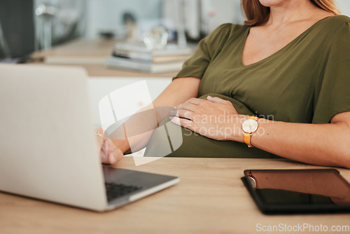 Image of Laptop, hands or pregnant woman in office typing on social media, website or internet for research. Maternity, communication closeup or designer with pregnancy or networking technology in workplace