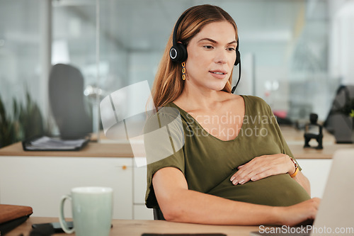 Image of Pregnant, woman and work in call center, office and hands on stomach in telemarketing workplace. Consultant, pregnancy and working in company or planning maternity for health and wellness in business