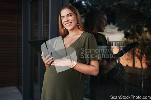 Image of Portrait, tablet and pregnant with woman at her business office at the start of her maternity leave from work. Tech, smile or pregnancy with a happy young employee planning online at her workplace