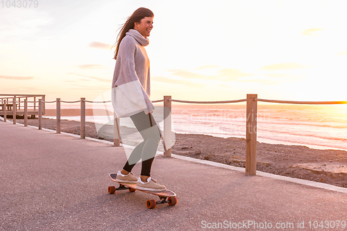 Image of Girl riding a skateboard 