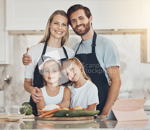 Image of Family, portrait and smile for cooking food in kitchen with vegetables for lunch, diet and nutrition. Happy parents and children, food and ingredients for meal prep, healthy and teaching the kids