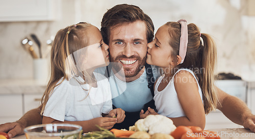 Image of Portrait, family and kiss on the cheek from children with their father in the kitchen of a home for cooking together. Face, smile and girl kids with their happy parent in the house to make a meal