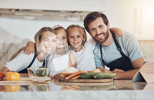 Image of Love, portrait and family cooking in kitchen together for bonding and preparing dinner, lunch or supper. Happy, smile and girl children and parents with vegetables or ingredients for meal at home.