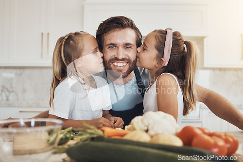 Image of Portrait, family and kiss on the cheek from girl kids with their father in the kitchen of a home for cooking together. Face, smile and sisters with their happy parent in the house to make a meal