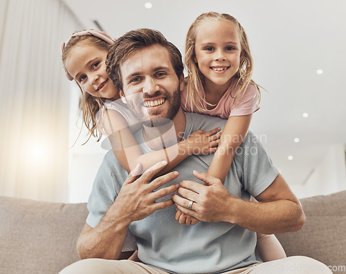 Image of Portrait, hug and girl kids with father on a sofa with love, bond and fun at home together. Happy family, face and children embrace parent in a living room with care, trust and support in a house