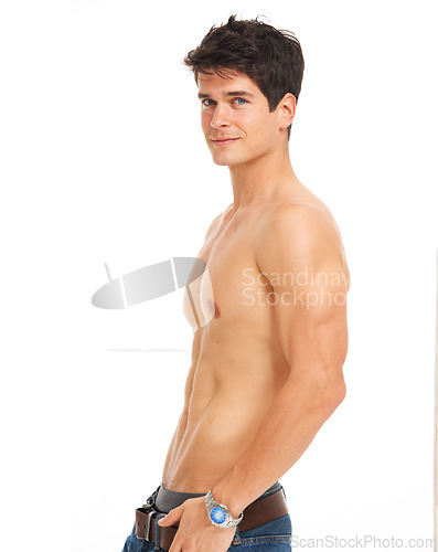 Image of Strong man, shirtless and portrait with athletic body, proud and six pack on white background in studio. Handsome model, stomach and topless with confidence on mock up, muscle and healthy aesthetic