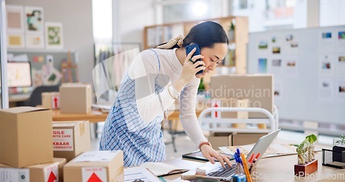 Image of Ecommerce, Asian woman with phone call and tech, typing and checking sales and work at fashion startup. Online shopping, boxes and small business owner with tablet, laptop and networking for orders.