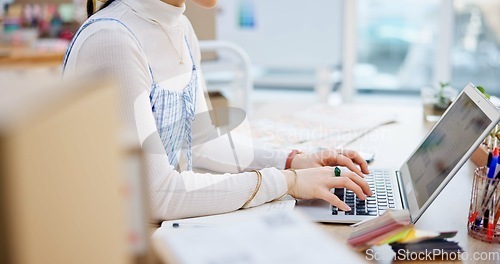 Image of Ecommerce, hands of woman at laptop with typing and writing sales report for work at fashion startup. Online shopping, boxes and small business owner with happiness, computer and website shop at desk