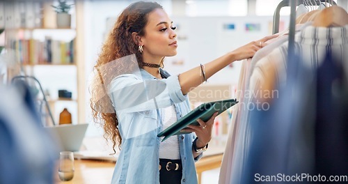 Image of Fashion, employee and woman with a tablet, store and inventory with ecommerce, connection and typing. Person, shop assistant and worker with technology, small business and online shopping with retail