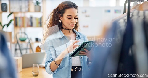 Image of Fashion, employee and woman with a tablet, store and inventory with ecommerce, connection and typing. Person, shop assistant and worker with technology, small business and online shopping with retail