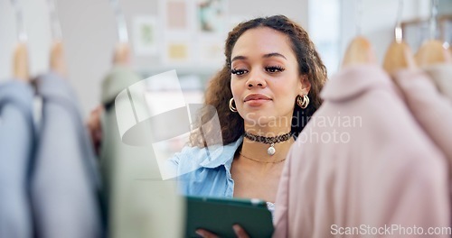 Image of Retail, ecommerce and woman with a tablet, store and inventory with connection, fashion or typing. Person, shop assistant or worker with technology, small business or boutique with retail or internet