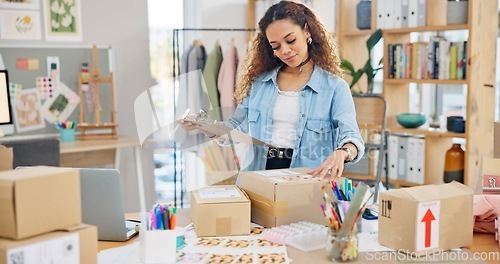 Image of Online order, label check and woman with small business in fashion with delivery and cardboard box. Stock, startup and sales of ecommerce and web boutique at home of a entrepreneur with checklist