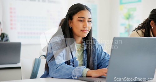 Image of Woman, student and laptop for classroom education, e learning and studying or research in college. Young people typing on computer for university or school information, FAQ or scholarship application