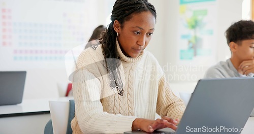 Image of Girl, students and laptop in a classroom, knowledge and creativity with connection, typing and learning. African person, academic and pc with kids, studying and education with lessons and high school