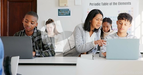 Image of Teacher, students and science, laptop in classroom with learning, education and innovation with tech. Explain, information and high school with people in class, teaching and scientific knowledge