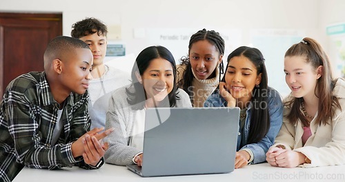 Image of Students, teacher and laptop for group learning, teaching and education in classroom, school or university. Young people, professor or woman on computer for information, presentation or class support