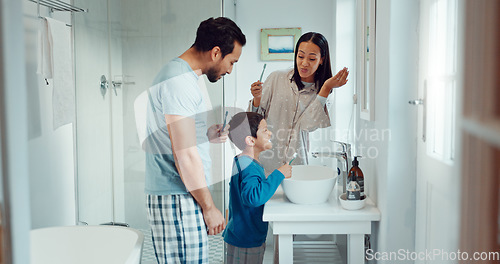 Image of Parents, child and brushing teeth in family home bathroom while learning or teaching dental hygiene. A woman, man and kid with toothbrush and toothpaste for health, cleaning mouth and wellness