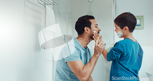 Image of Shaving, bathroom and father teaching child about grooming, hygiene and facial routine. Happy, help and a young dad showing a boy kid cream or soap for hair removal together in a house in the morning