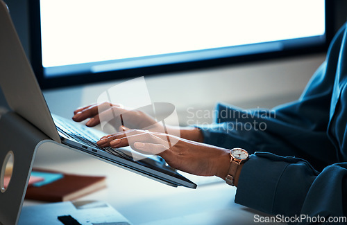 Image of Laptop, night and hands of entrepreneur typing and working online for company website and doing research on internet. Closeup, web and employee writing a project with deadline and information