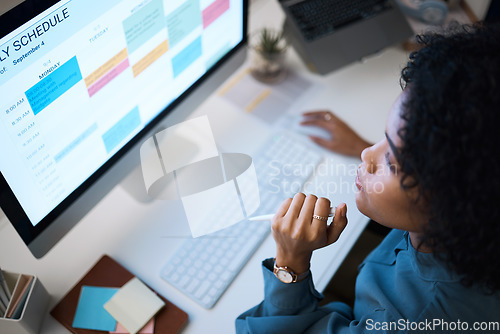 Image of Woman with computer, thinking and checking schedule, agenda and reminder for office administration. Online calendar, planner and girl at desk planning spreadsheet for time management with high angle.