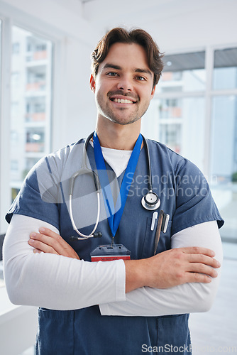 Image of Medical portrait, arms crossed and happy man, doctor or surgeon with confidence, nurse pride and ready for wellness service. Healthcare trust, happiness and nursing medic for cardiology support help