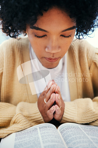 Image of Woman, bible and praying in Church, worship and Christian religion, reading or studying. Person, holy book and meditation for God, Jesus Christ and faith in spiritual gospel, praise or hope for help