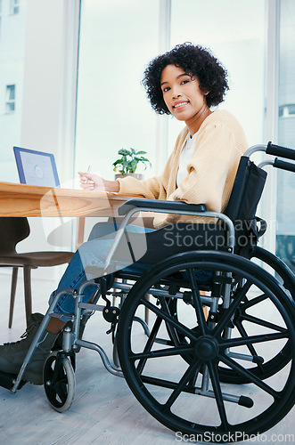 Image of Office, smile and portrait of woman in wheelchair at desk on laptop working on project, report and research. Company, startup and person with disability on computer for internet, email and planning