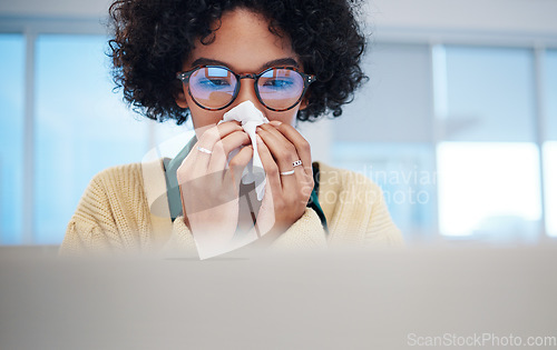 Image of Sick business woman on computer, blowing nose and covid allergy, disease or virus in startup company. Professional, tissue paper and allergies for health problem, cold fever and bacteria in winter