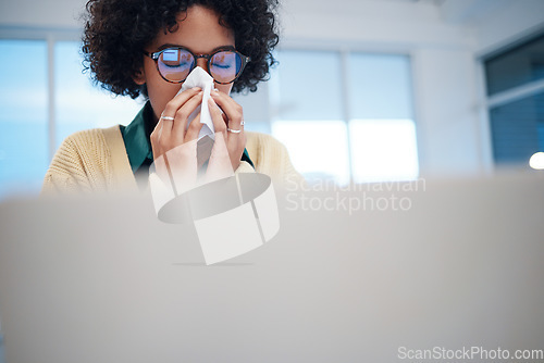 Image of Sick business woman blowing nose for allergy, covid disease and virus in startup company. Professional on computer, tissue paper and allergies for health problem, cold fever and bacteria in winter