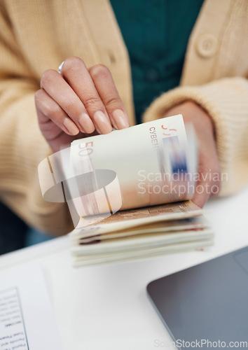 Image of Hands, budget and a business person counting money closeup in the office of a bank for accounting. Cash, finance and economy with a financial advisor closeup in the workplace for investment growth