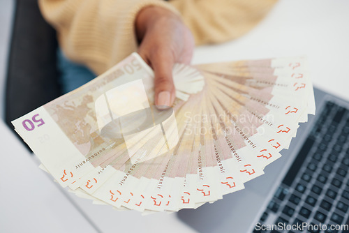 Image of Person, hand and money fan in financial freedom, salary or payment for investment, growth or profit at office. Closeup of employee with cash flow, paper note or bills in expenses, savings or shopping