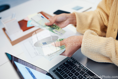 Image of Hands, money and business woman with laptop in office for budget, savings and investment closeup. Cash, counting and female investor with payment, loan or sale, deal and profit, growth or management