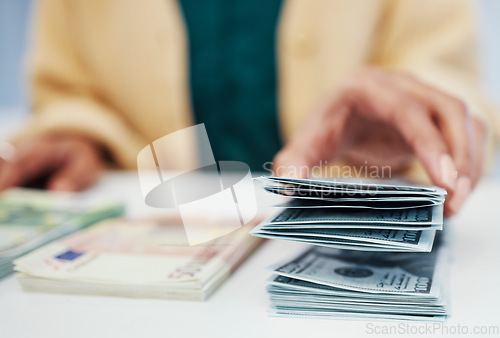 Image of Hands, finance and a business person counting cash closeup in the office of a bank for accounting. Money, budget and economy with a financial advisor closeup in the workplace for investment growth