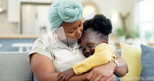 Image of Mom, kiss or hug sleeping child on couch for love, care or console for comfort in lounge at home. Black woman, happy mother or embrace girl kid on lap for nap, support or relax on sofa in living room