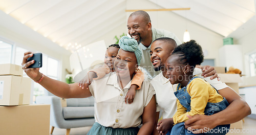 Image of Moving, happy family and selfie with kids in new home, boxes and people in living room of house. African mother, father and children in self portrait with boxes, real estate and happy investment.